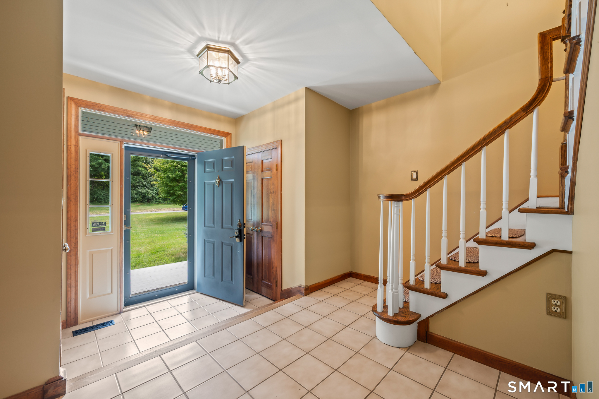 16 Cedar Grove Road Southbury, CT 06488 - Photo 4 of 38 Easy entry to stairs to upper level.