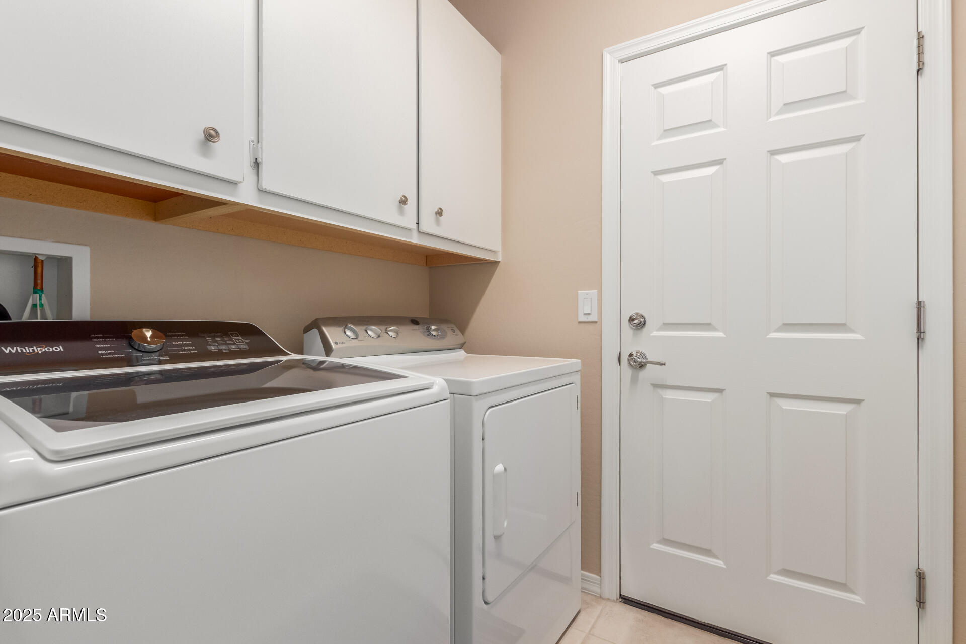 6573 West Mockingbird Way Florence, AZ 85132 - Photo 18 of 36 a utility room with dryer and washer