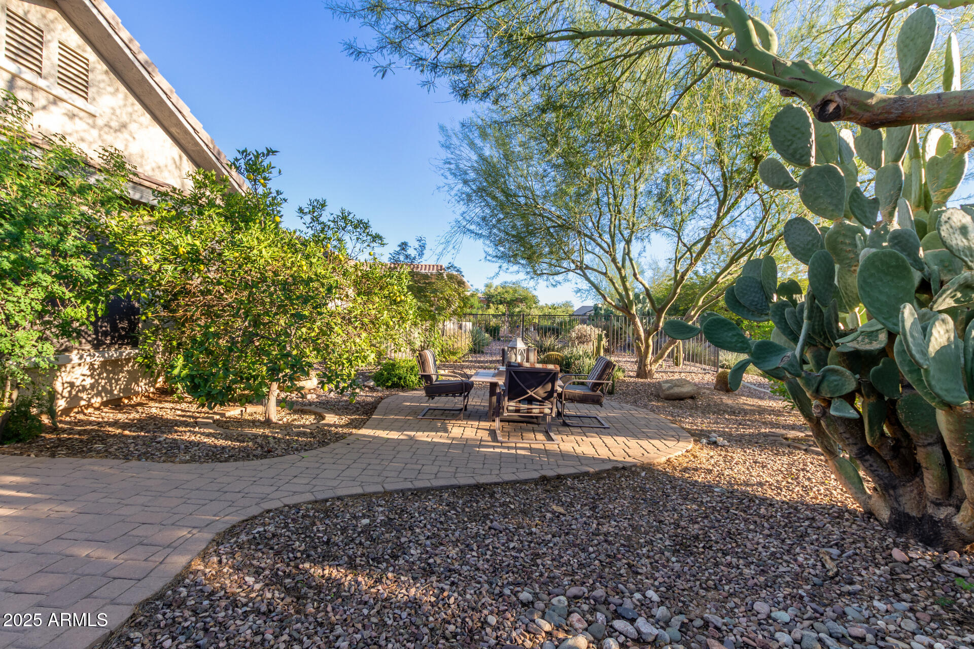 6573 West Mockingbird Way Florence, AZ 85132 - Photo 20 of 36 a view of a bench in a yard