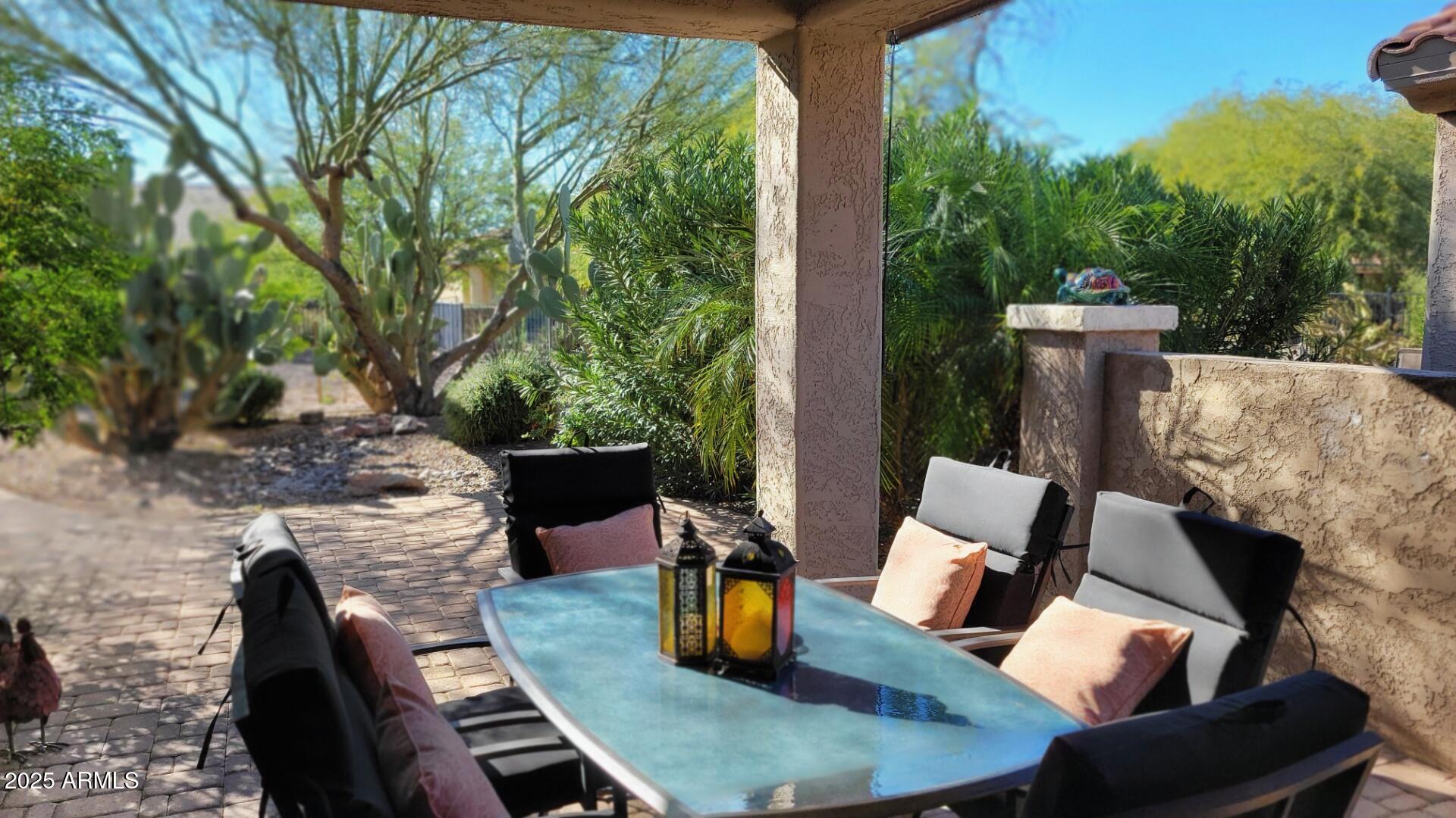 6573 West Mockingbird Way Florence, AZ 85132 - Photo 22 of 36 a view of a patio with couches chairs