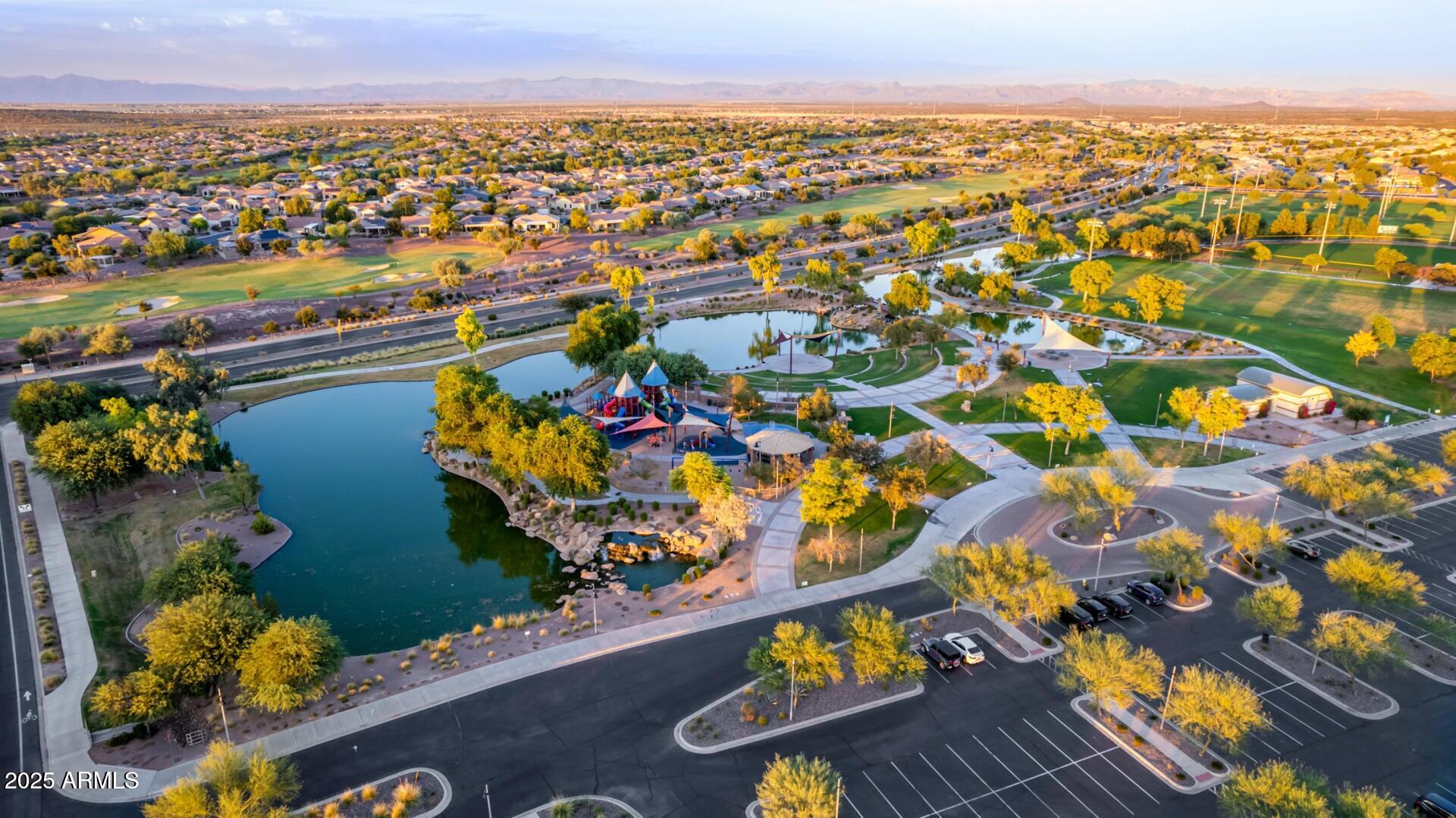 6573 West Mockingbird Way Florence, AZ 85132 - Photo 24 of 36 an aerial view of residential houses with outdoor space