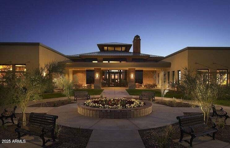 6573 West Mockingbird Way Florence, AZ 85132 - Photo 36 of 36 a view of a patio with table and chairs with plants