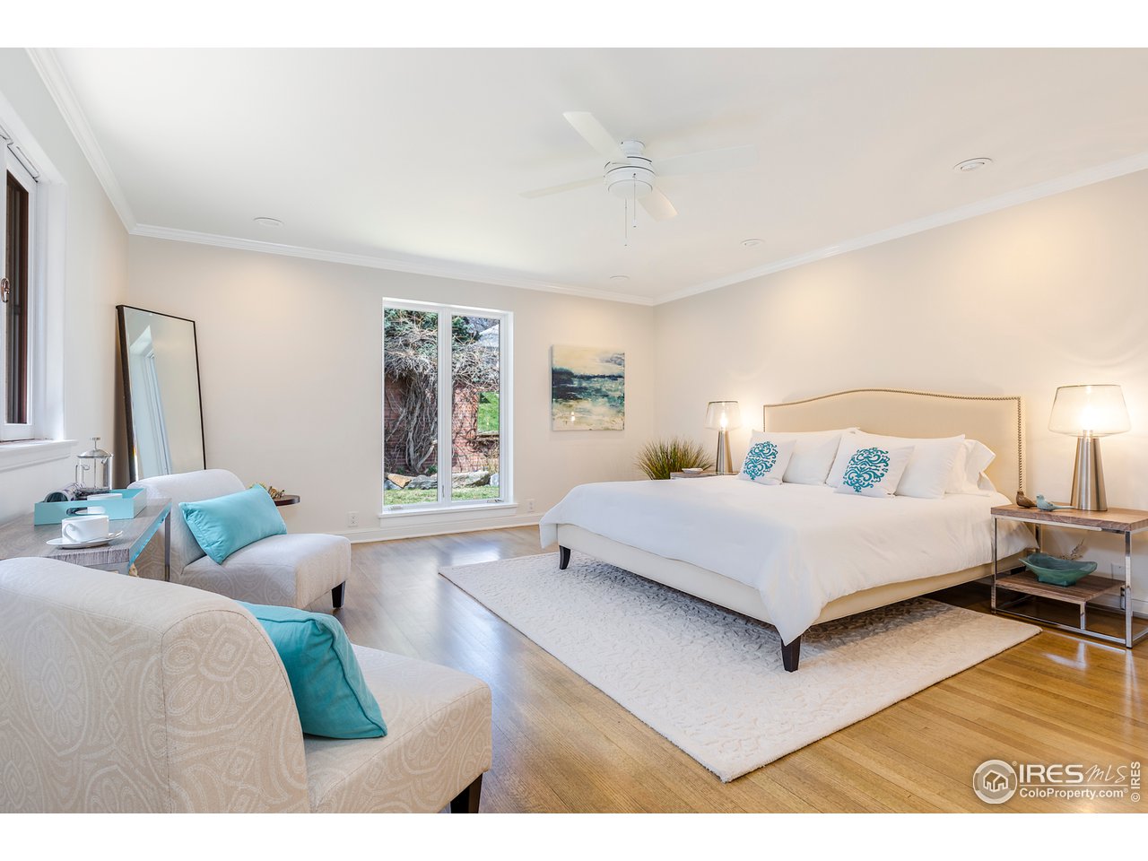 733 13th Street Boulder, CO 80302 - Photo 16 of 37 a bedroom with a bed and window