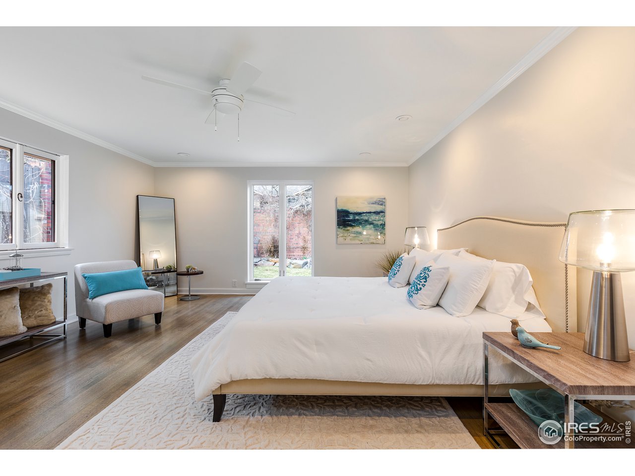 733 13th Street Boulder, CO 80302 - Photo 18 of 37 a bedroom with a bed window and a couch