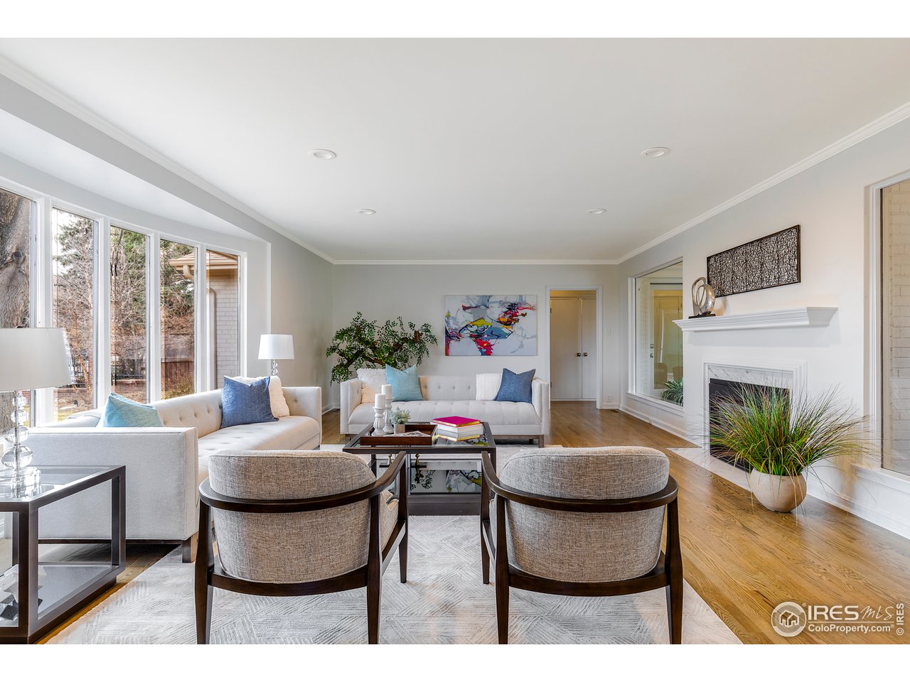 733 13th Street Boulder, CO 80302 - Photo 2 of 37 a living room with furniture a fireplace and a table