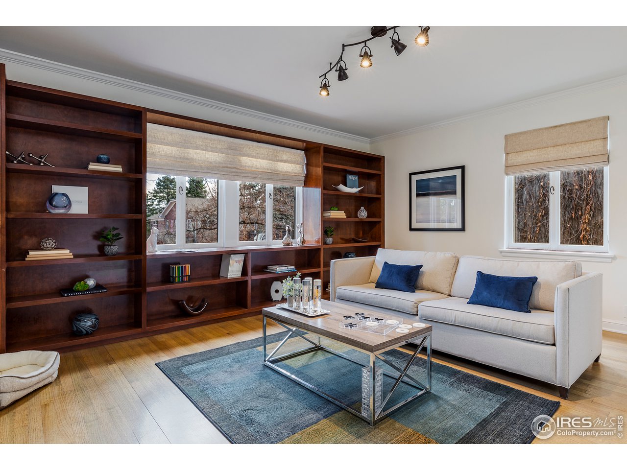 733 13th Street Boulder, CO 80302 - Photo 25 of 37 a living room with furniture and a window