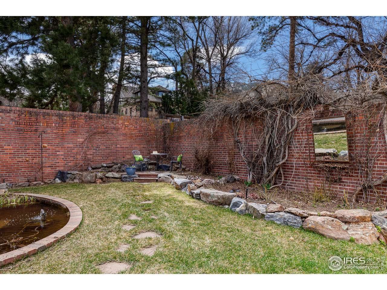 733 13th Street Boulder, CO 80302 - Photo 37 of 37 a view of a backyard with plants and a patio