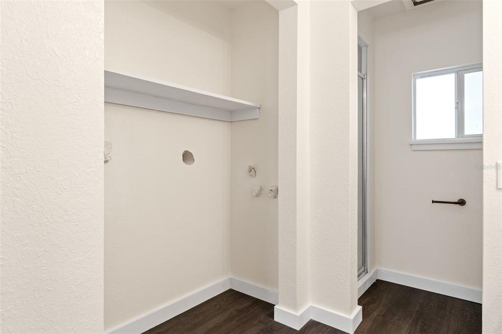 29129 Johnston Road, Unit 2626 Dade City, FL 33523 - Photo 12 of 31 a view of a hallway with wooden floor