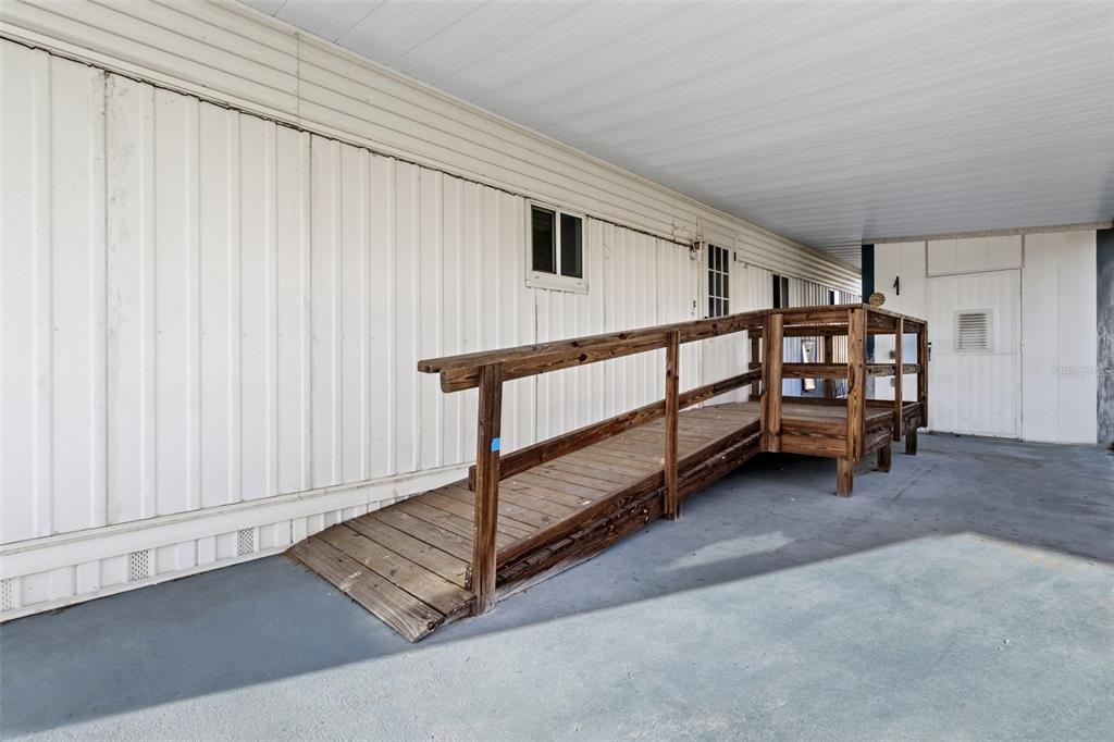 29129 Johnston Road, Unit 2626 Dade City, FL 33523 - Photo 20 of 31 a view of an empty room with stairs