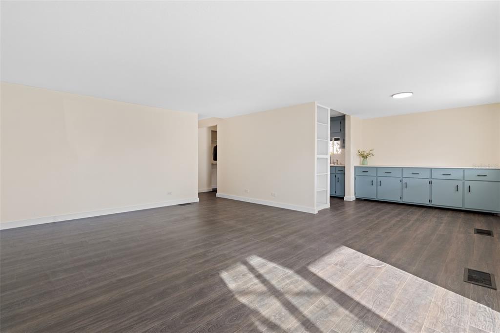29129 Johnston Road, Unit 2626 Dade City, FL 33523 - Photo 8 of 31 a view of a kitchen with wooden floor