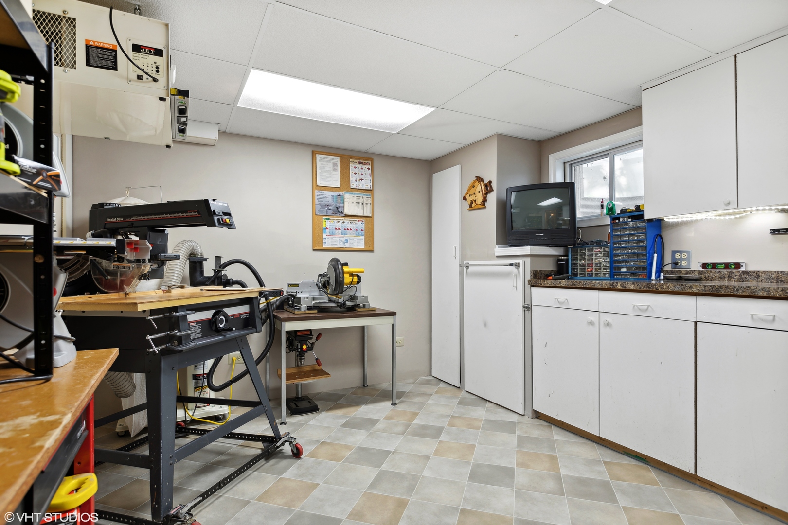 966 Ridgewood Drive Cary, IL 60013 - Photo 26 of 31 a kitchen with cabinets and chairs in it