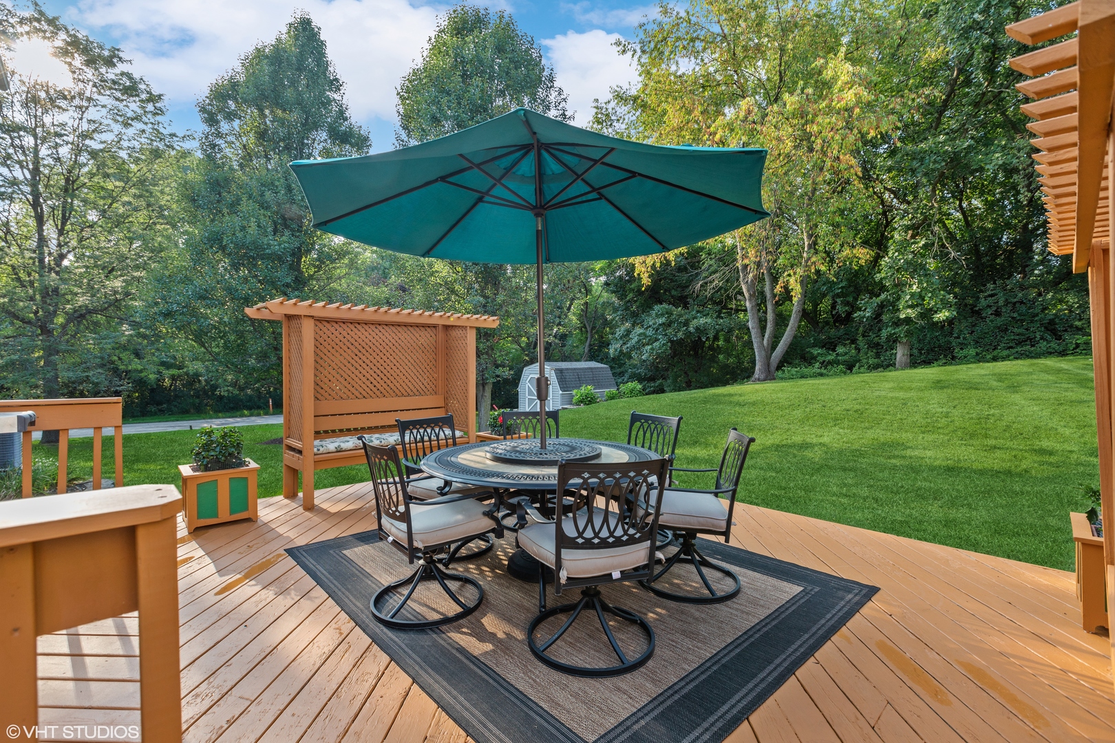 966 Ridgewood Drive Cary, IL 60013 - Photo 30 of 31 a view of a table and chairs on the deck