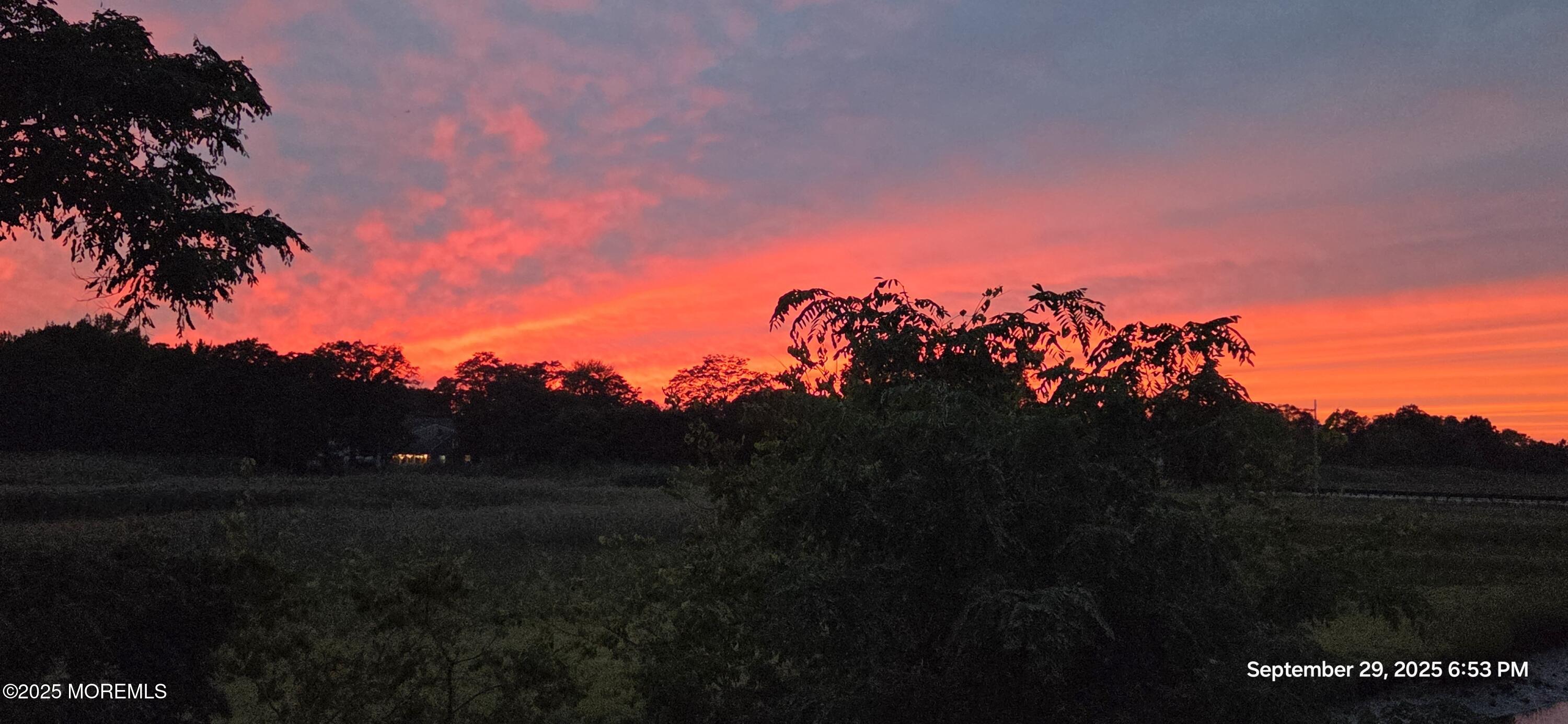 177 Creek Road Keansburg, NJ 07734 - Photo 28 of 32 Sunset View from top deck
