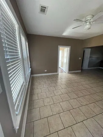 a view of a livingroom with a staircase
