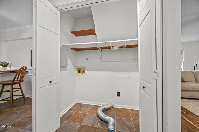 a bathroom with a granite countertop toilet a sink and a mirror