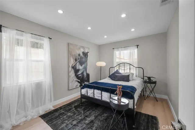 a view of a livingroom with furniture and a window