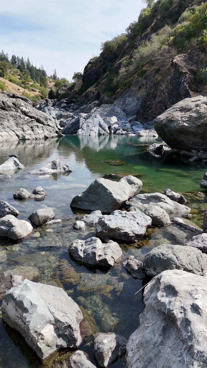 35000 Mendocino Pass Road Covelo, CA 95428 - Photo 19 of 26 a view of a lake with a city