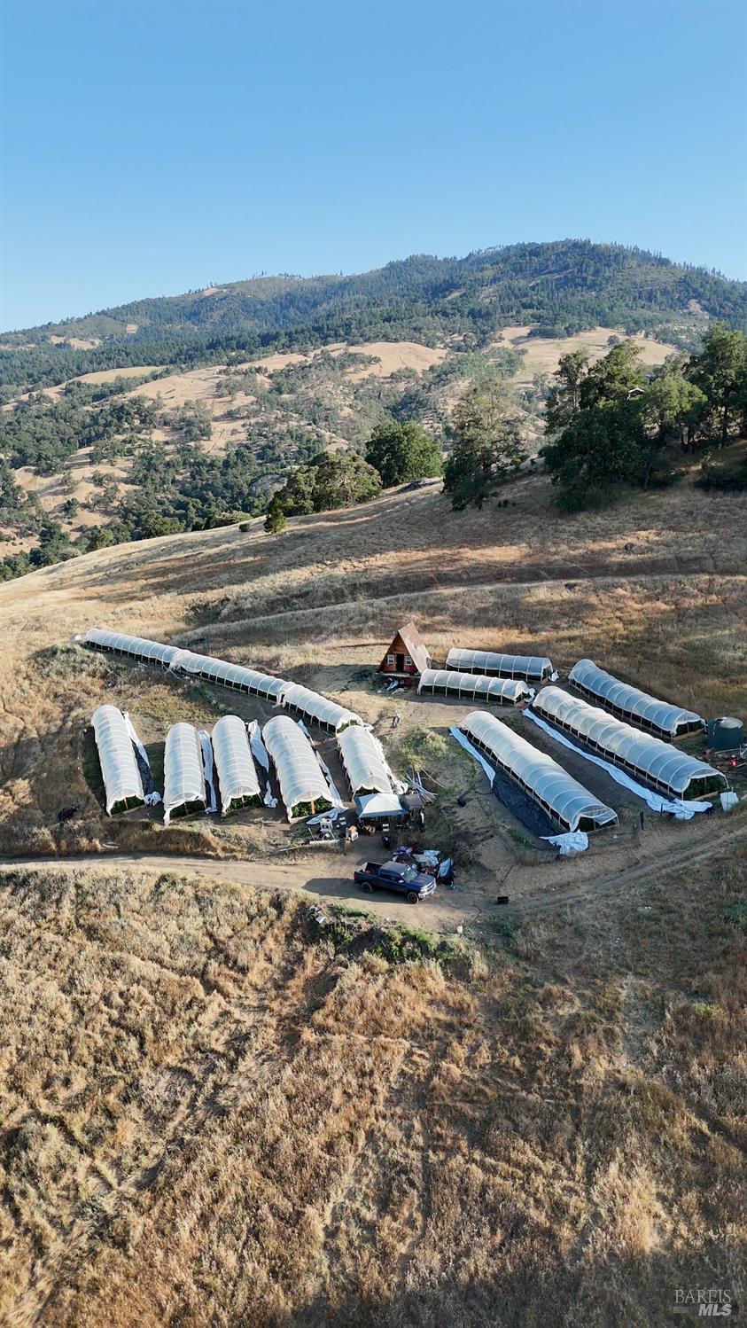 35000 Mendocino Pass Road Covelo, CA 95428 - Photo 2 of 26 a view of a lake with a mountain