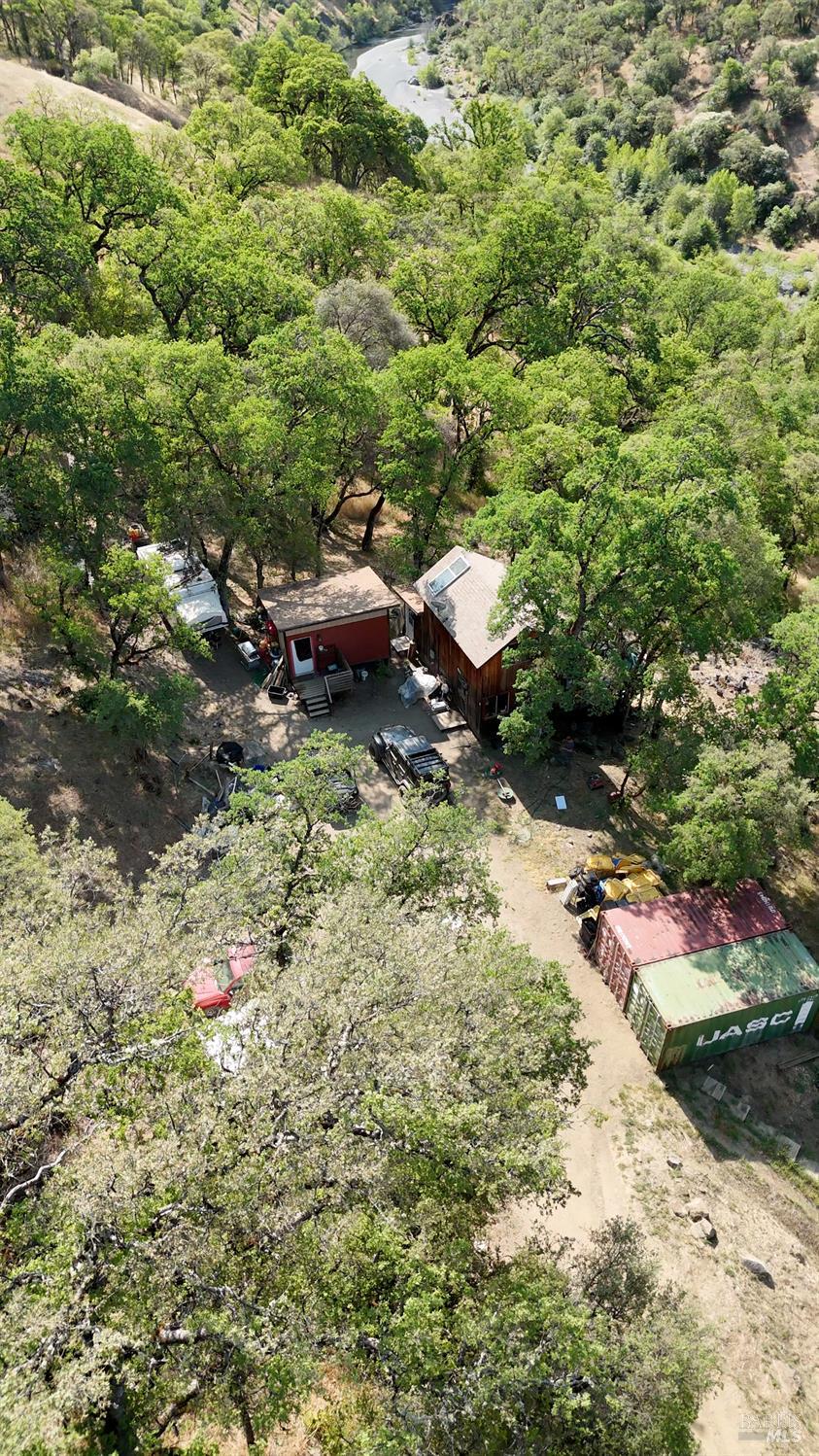 35000 Mendocino Pass Road Covelo, CA 95428 - Photo 3 of 26 a backyard of a house with lots of green space