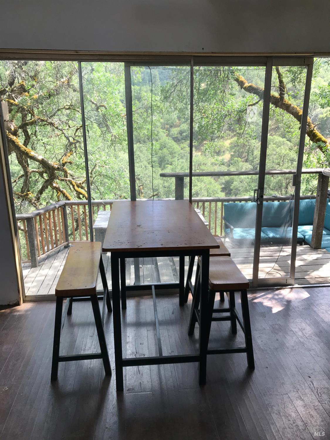 35000 Mendocino Pass Road Covelo, CA 95428 - Photo 8 of 26 a view of a dining room with furniture and window