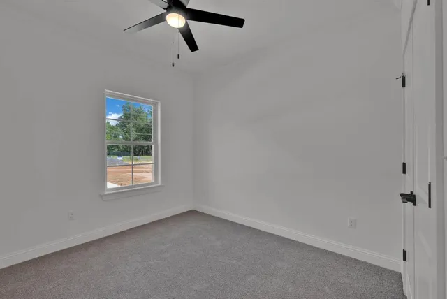 a view of room with cabinets