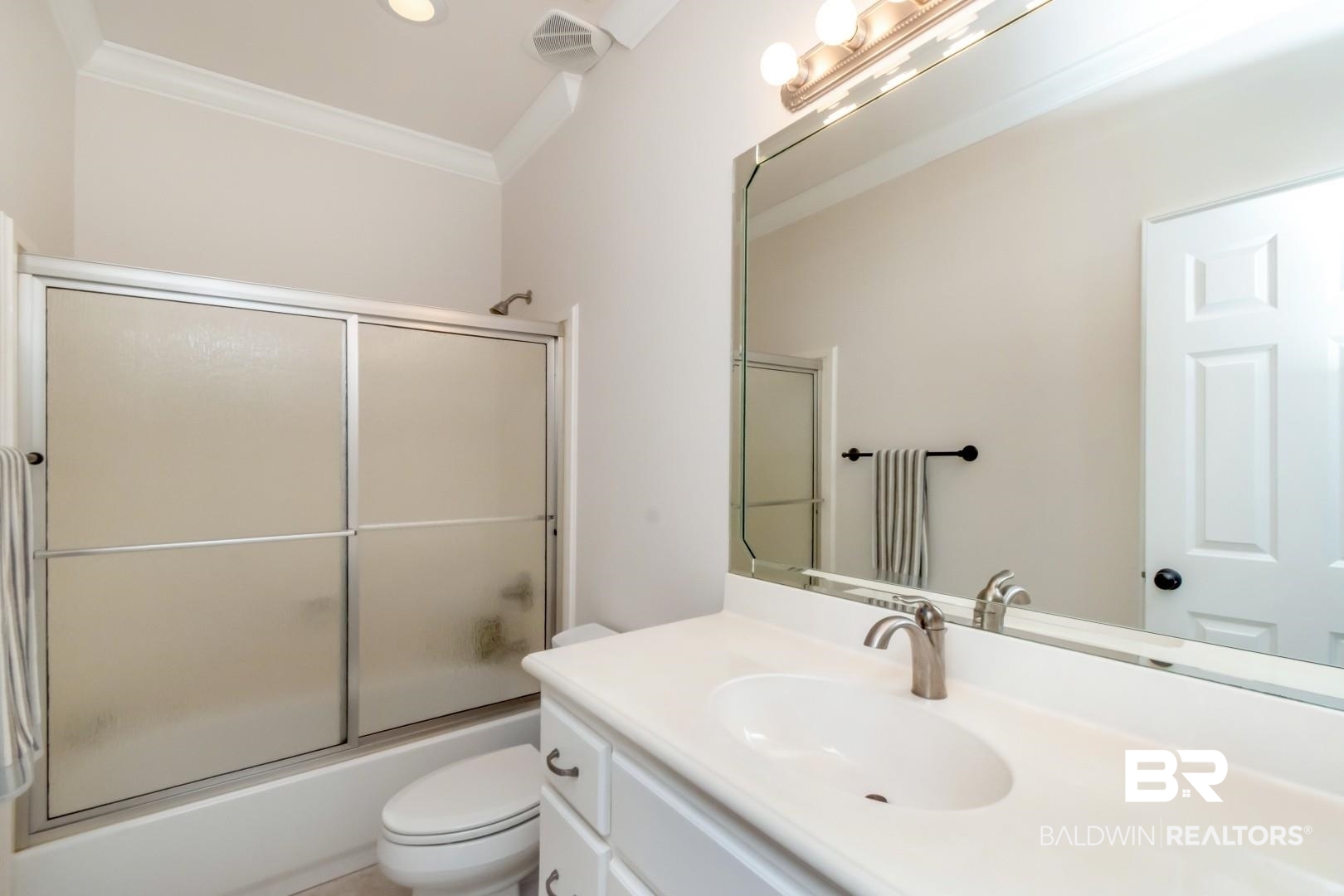 1360 Dykes Road North Mobile, AL 36608 - Photo 22 of 40 Full bath with vanity, shower / bath combination with glass door, and crown molding