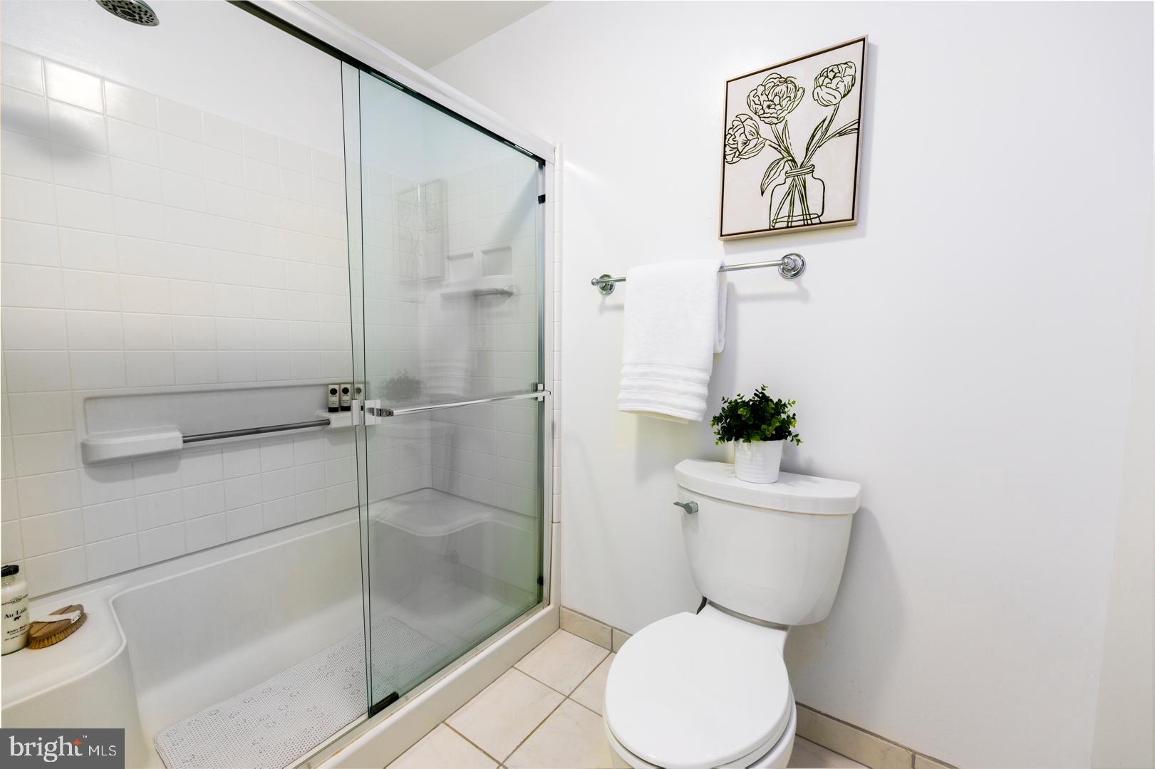 7930 Church Neck Road St. Michaels, MD 21663 - Photo 23 of 41 a white toilet sitting next to a bathroom