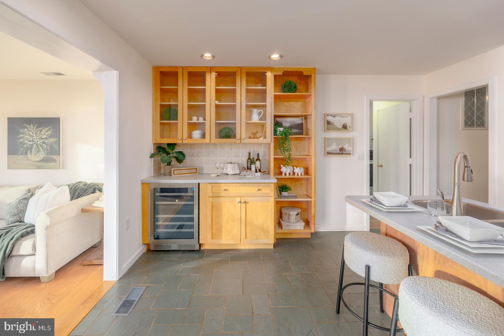 7930 Church Neck Road St. Michaels, MD 21663 - Photo 27 of 41 a spacious bedroom with a bed and a table