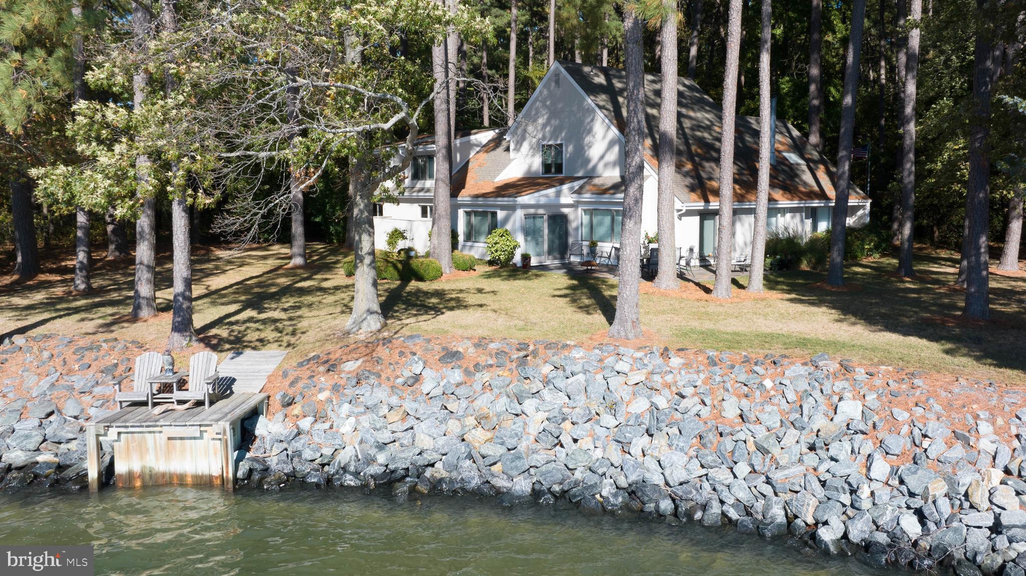 7930 Church Neck Road St. Michaels, MD 21663 - Photo 4 of 41 a view of a lake with house
