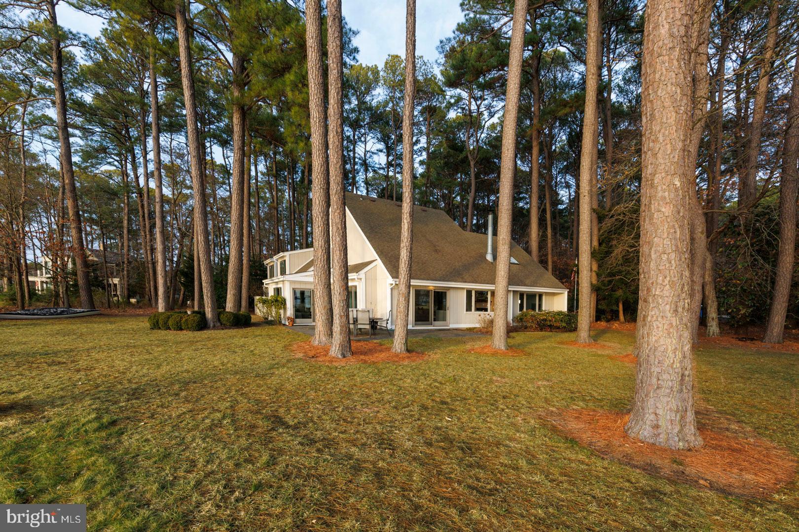 7930 Church Neck Road St. Michaels, MD 21663 - Photo 6 of 41 front view of a house with a yard