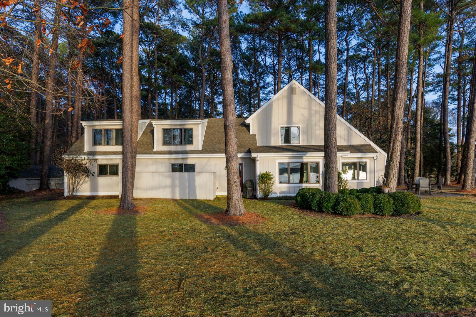 7930 Church Neck Road St. Michaels, MD 21663 - Photo 7 of 41 a view of a house with a yard