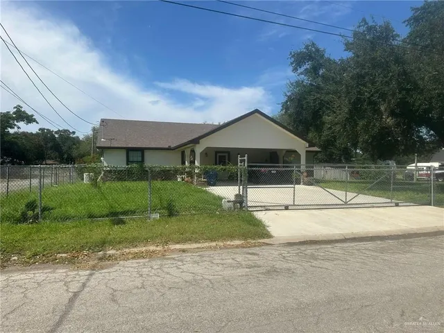 a house view with a garden space