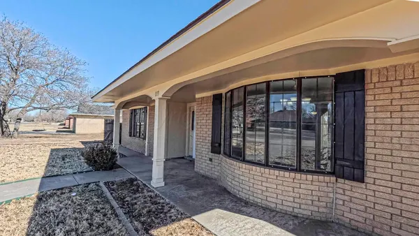 a front view of a house with a glass door