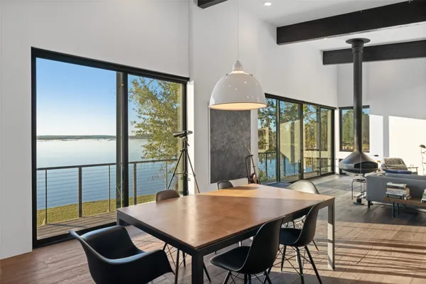 a kitchen with a table and chairs in it