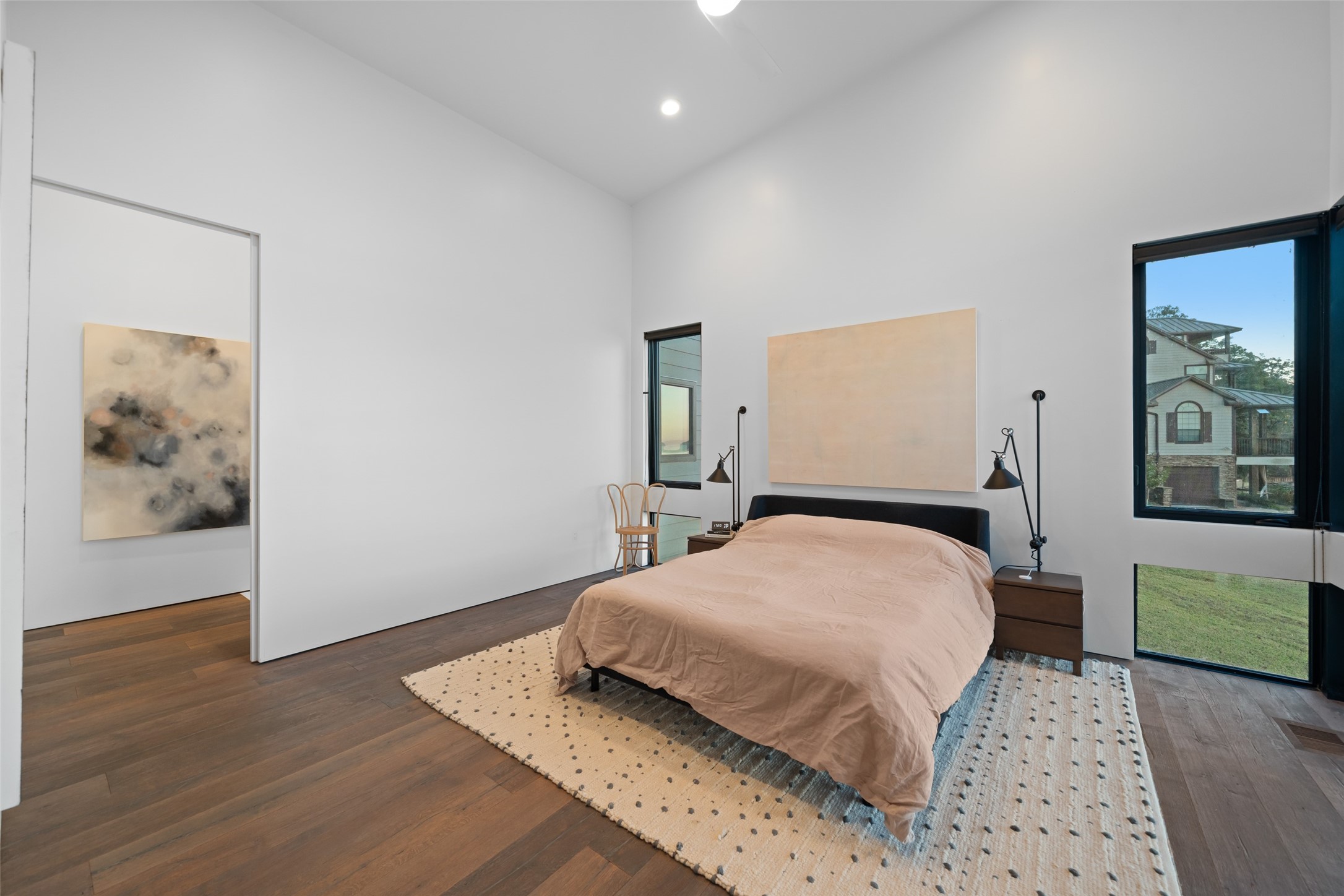 152 Lori Lane Trinity, TX 75862 - Photo 11 of 50 a bedroom with a bed and painting on the wall