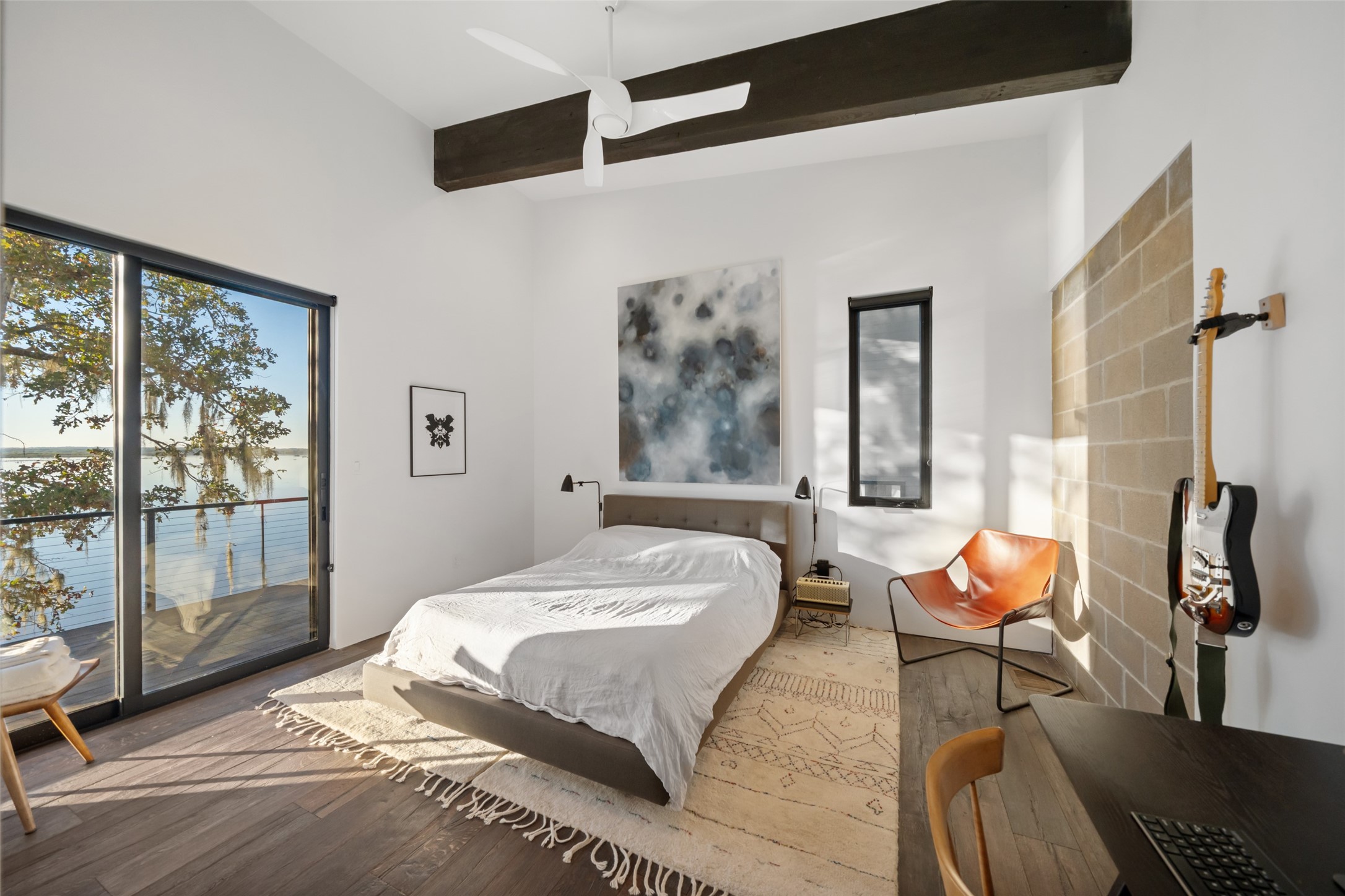 152 Lori Lane Trinity, TX 75862 - Photo 15 of 50 a bedroom with a bed and glass door