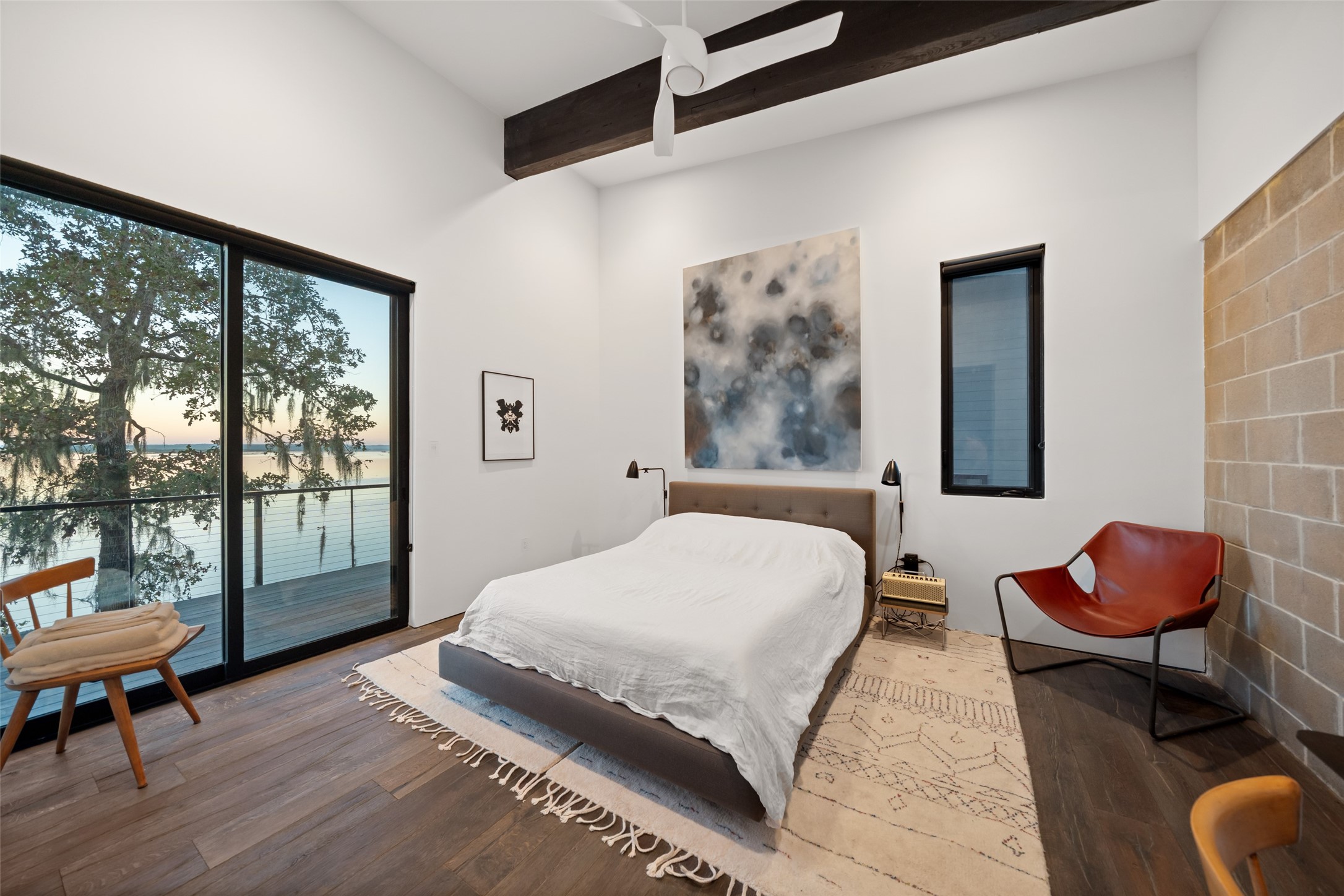 152 Lori Lane Trinity, TX 75862 - Photo 16 of 50 a bedroom with a bed and wooden floor