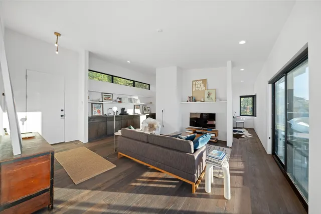 a view of a balcony with wooden floor and stairs