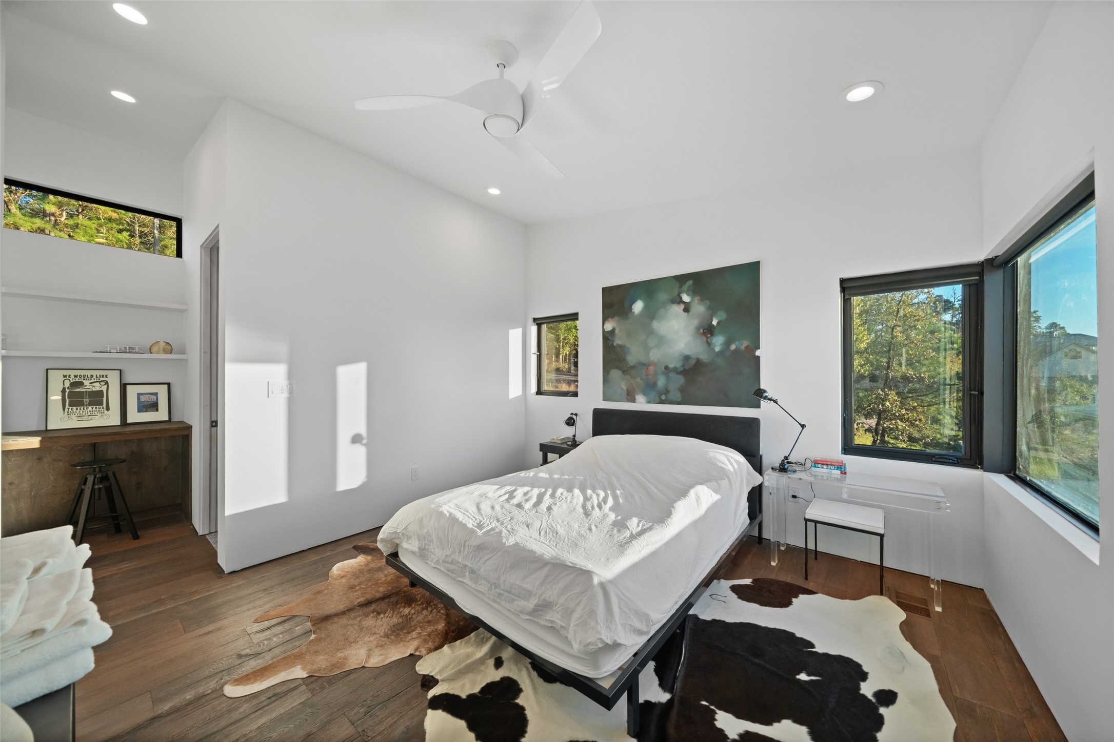 152 Lori Lane Trinity, TX 75862 - Photo 30 of 50 a bedroom with a bed and wooden floor