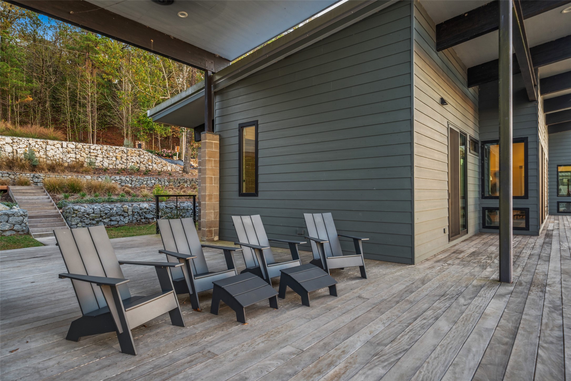 152 Lori Lane Trinity, TX 75862 - Photo 33 of 50 a view of a patio with table and chairs and wooden floor