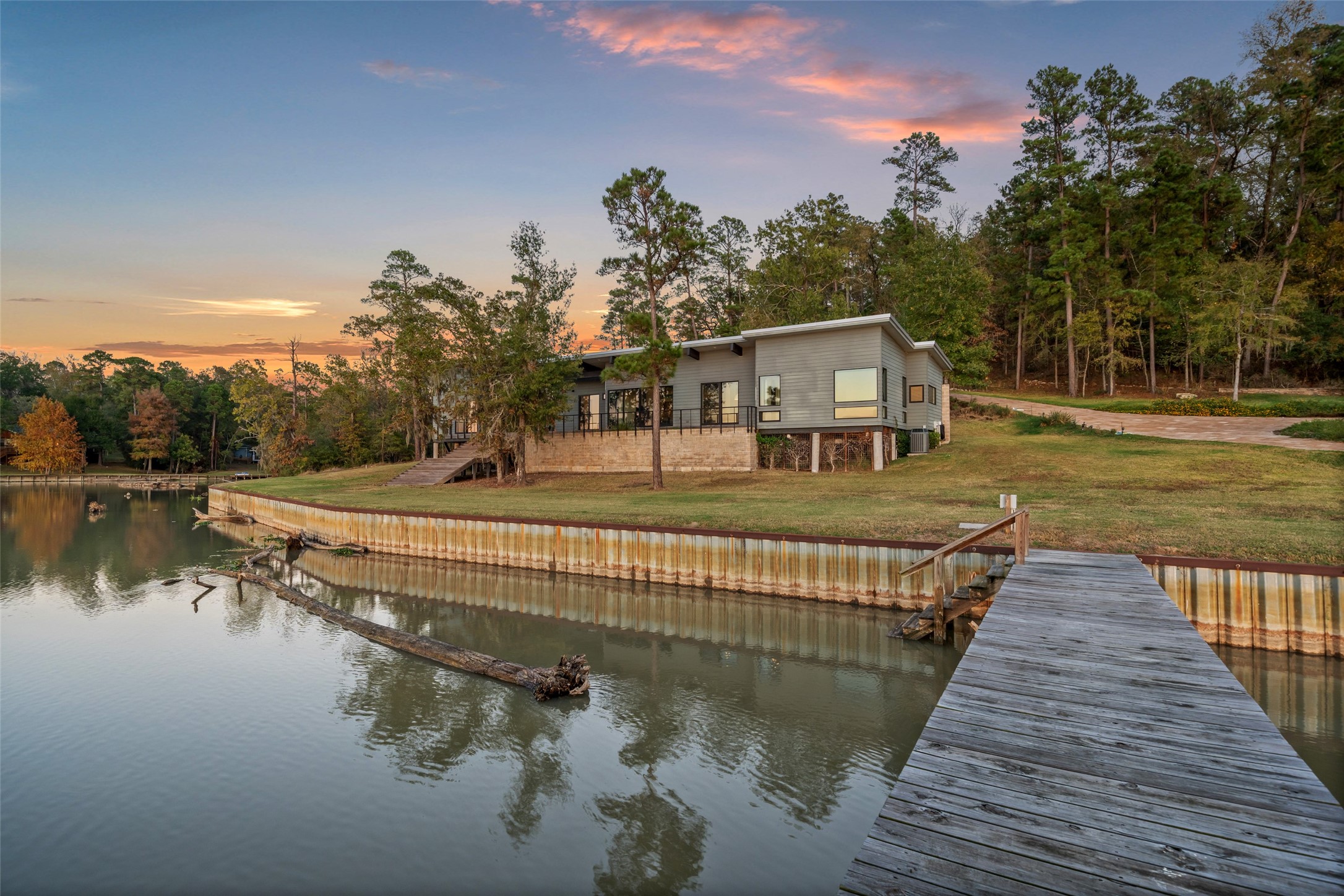 152 Lori Lane Trinity, TX 75862 - Photo 35 of 50 a view of a house with a lake view