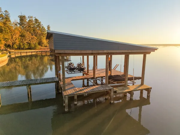 a view of sitting area with furniture and floor to ceiling window