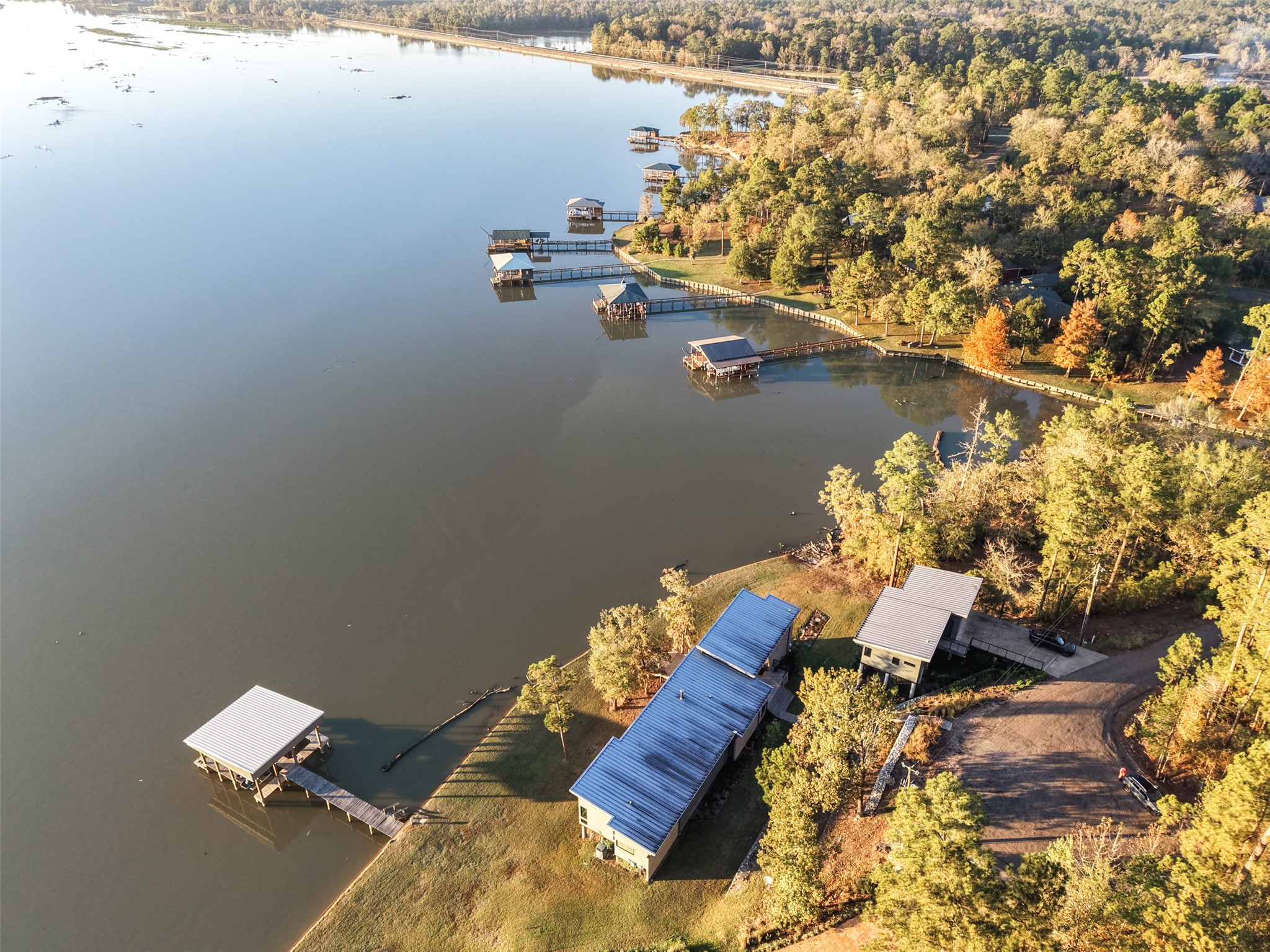152 Lori Lane Trinity, TX 75862 - Photo 42 of 50 an aerial view of a house with a lake view