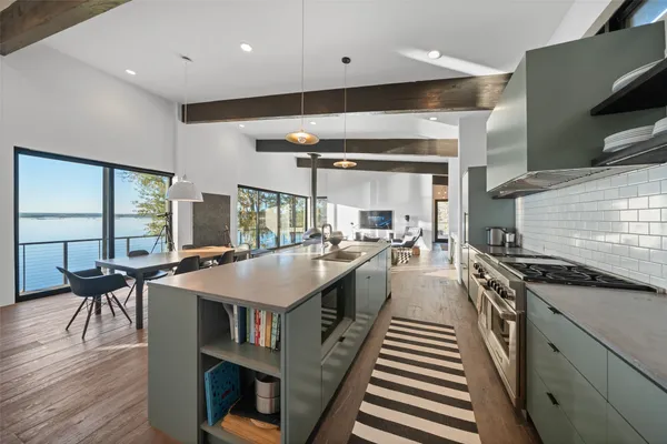 a kitchen with a stove and a sink