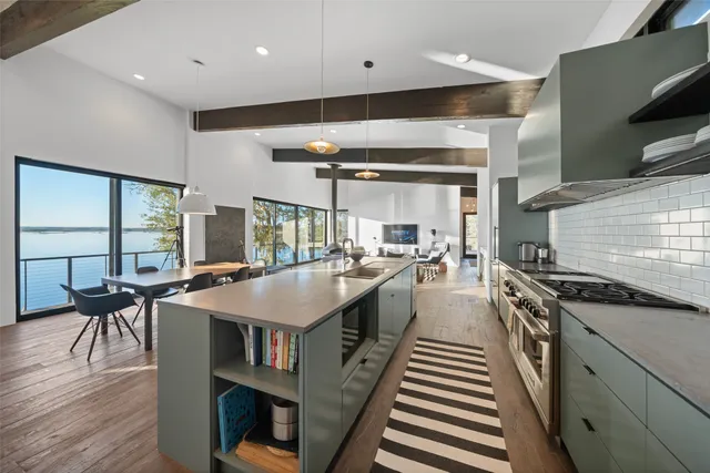 a kitchen with a stove and a sink