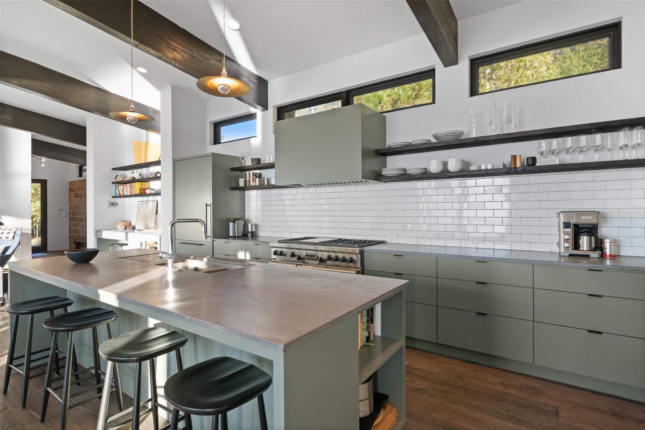 152 Lori Lane Trinity, TX 75862 - Photo 7 of 50 a kitchen with a table chairs and cabinets