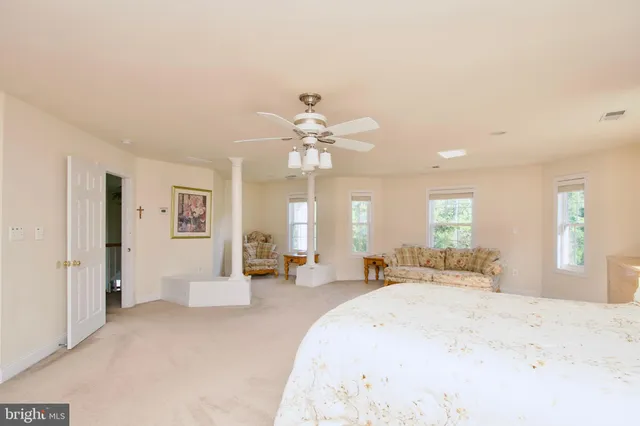 a view of house with deck and outdoor space