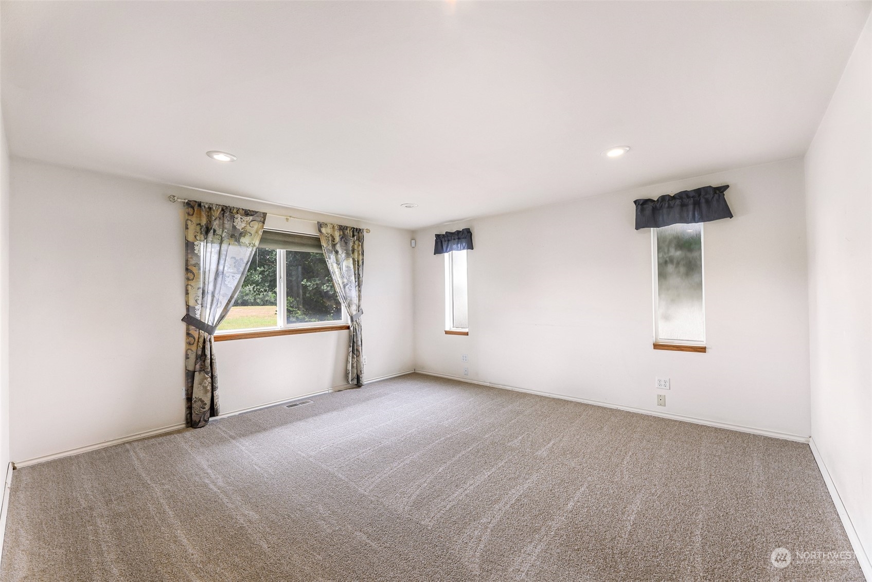 18453 West Stevens Road Burlington, WA 98233 - Photo 7 of 39 a view of an empty room with a window
