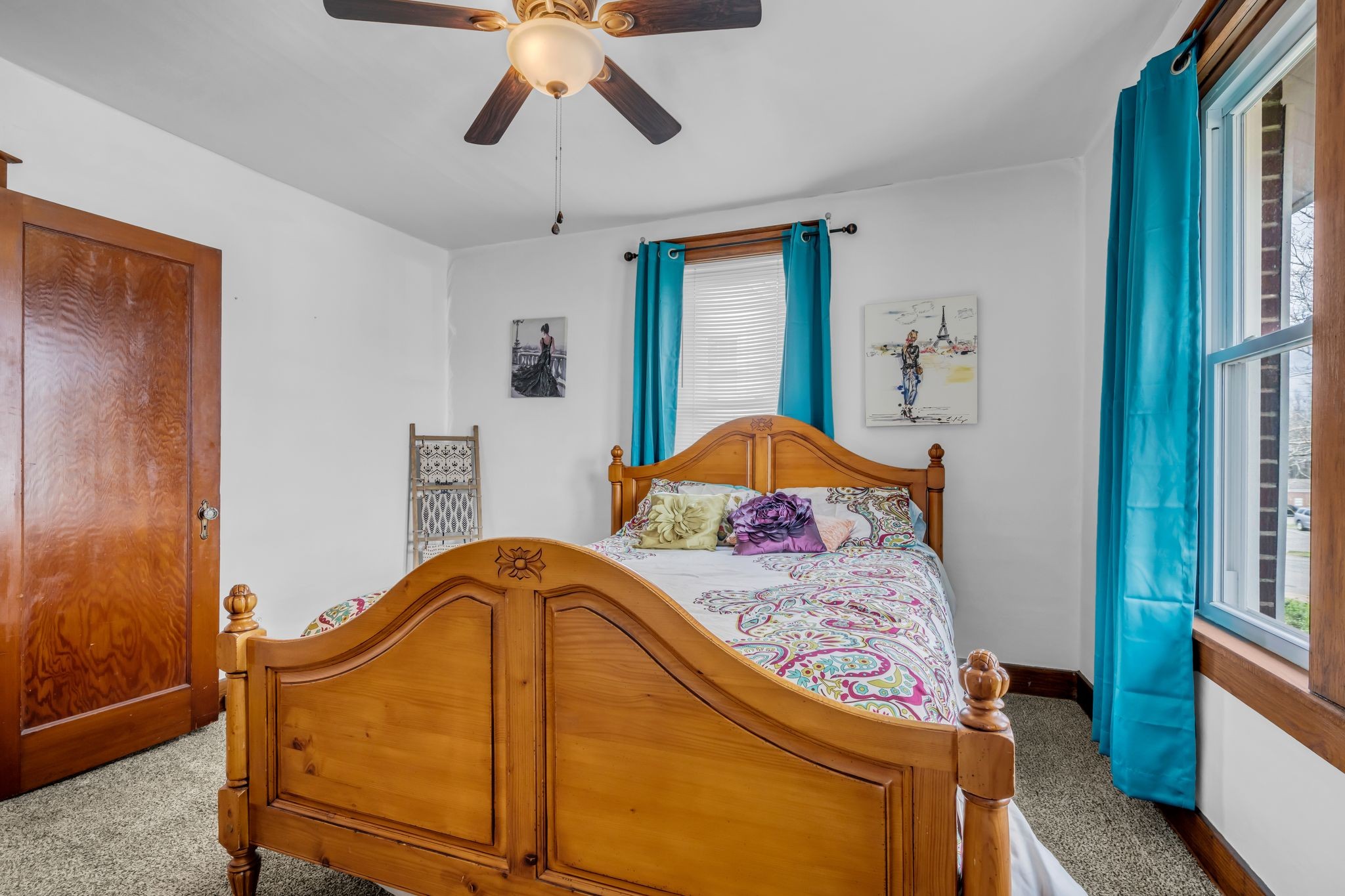 104 West Chestnut Street Dickson, TN 37055 - Photo 18 of 27 a bedroom with a bed and window