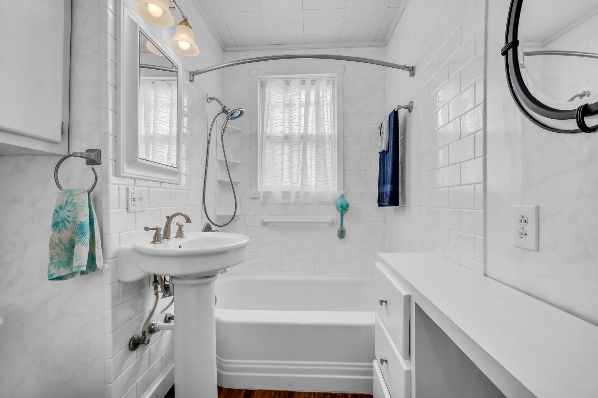 104 West Chestnut Street Dickson, TN 37055 - Photo 19 of 27 a bathroom with a sink a toilet and a mirror
